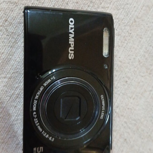 Olympus camera used, unknown functionality