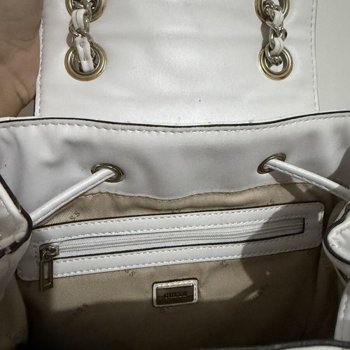 Guess Backpack white like new with silver details and charm