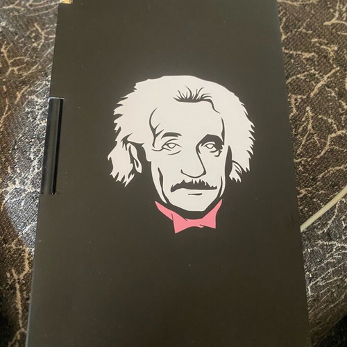 Notebook with Albert Einstein reference and pencil new