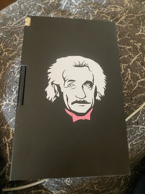 Notebook with Albert Einstein reference and pencil new