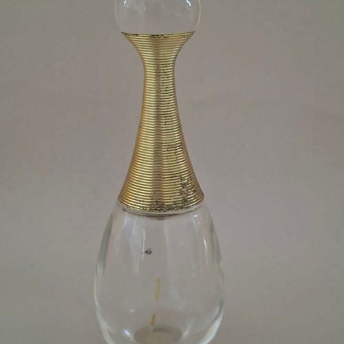Roberto Cavalli Oro and Christian Dior J'adore empty perfume bottles