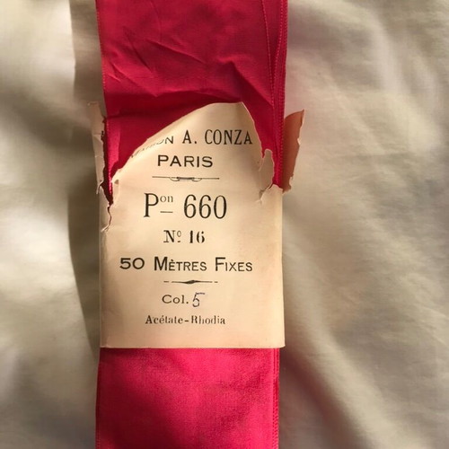 2 rolls of ribbons new in rose and fuchsia shades