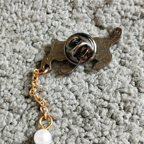 Cat brooch like new, white and gold-colored