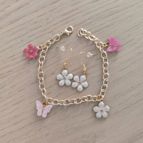 Bracelet and earrings set like new, pink shades