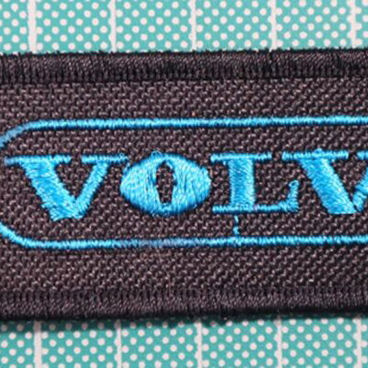Fabric keychain Truck with embroidered logo 12x3 cm new, black