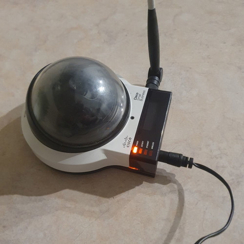 Security camera used with power supply, remote motion, audio support
