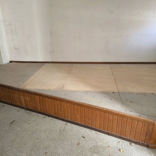 Raised floor used for desk or bed placement