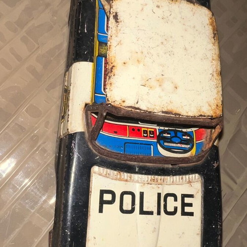 Tin car used with working wheels, rare