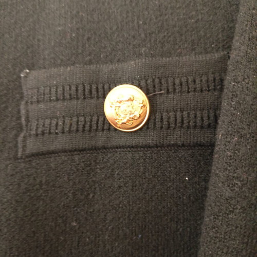 Classic fine knit skirt and blouse set with gold buttons