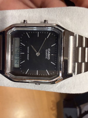 Casio vintage watch like new, black unisex