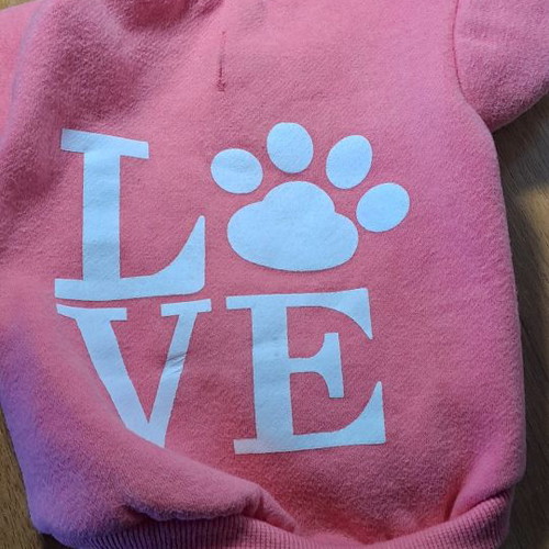 Dog accessory used, pink hoodie sweater