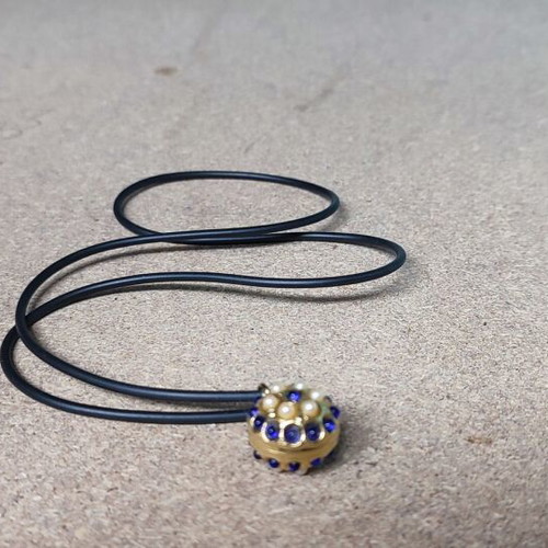 Pendant with strap and beads like new, metal gold part