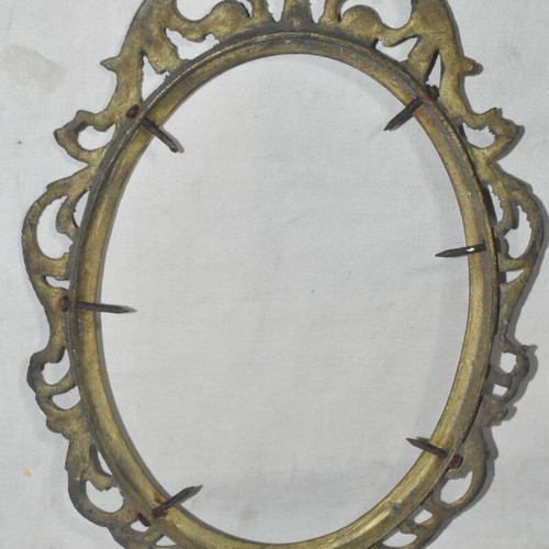 Brass oval frame used with embossed vintage design