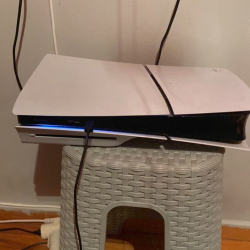 Play Station 5 Slim with 2 controllers and 3 original games like new