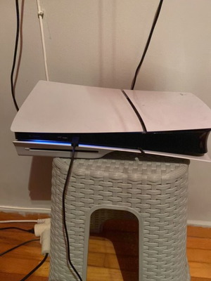 Play Station 5 Slim with 2 controllers and 3 original games like new