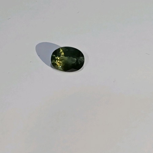 Natural bicolor sapphire 1.03 ct, oval, mixed cut, like new
