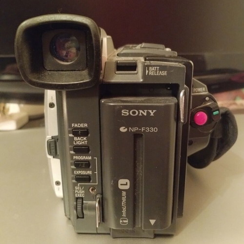 Sony Handycam DCR-TRV820E digital video camera used with printer, battery, charger