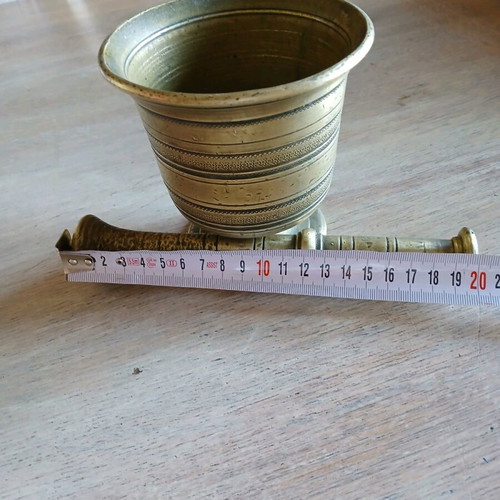 Antique brass mortar used with subtle design