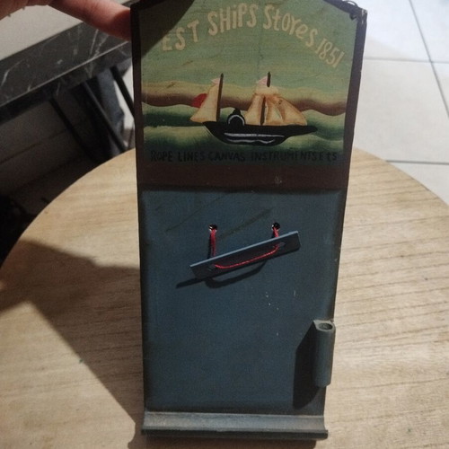 Wooden decorative hanging with boat for notes