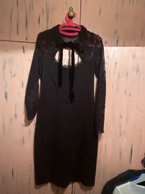 Black dress like new with lace details and open back