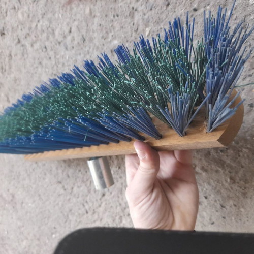 Street brush new with stiff bristles and metal handle