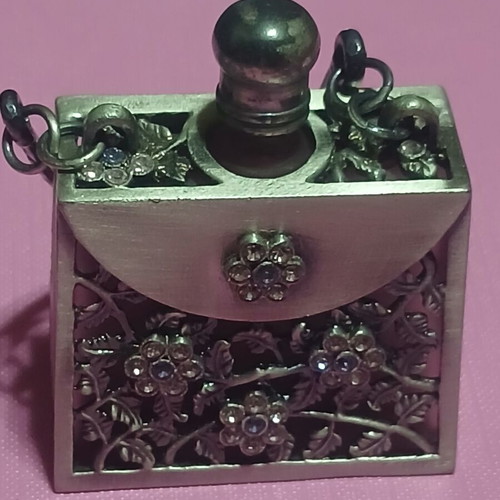 Vintage perfume bottle in Art Nouveau style, new