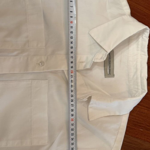 Set of 3 pieces like new, white semize shirt with letters, green skirt, fuchsia belt