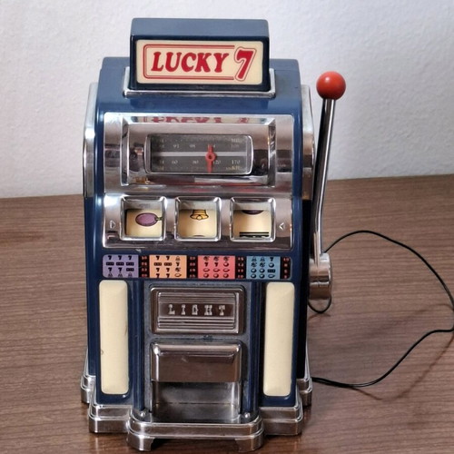 Marksman Las Vegas Lucky 7 AM/FM radio used, one armed bandit slot machine