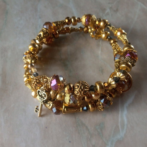 Handmade bracelet new in golden tones