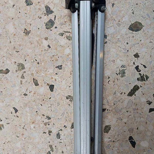 Professional aluminum photographic tripod used