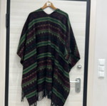 Women's wool cape used with multicolor pattern
