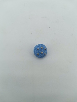Blue button used with metal pins from 1960