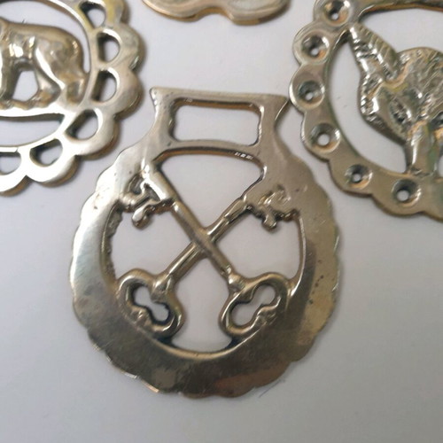 Authentic brass horse medallions set of 4 like new