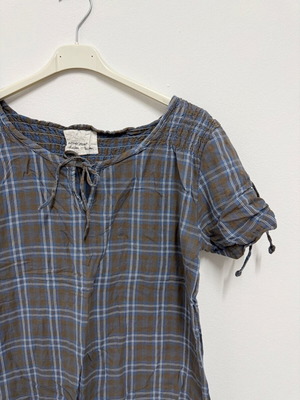 Checked blouse like new, size L with front tie and adjustable sleeves