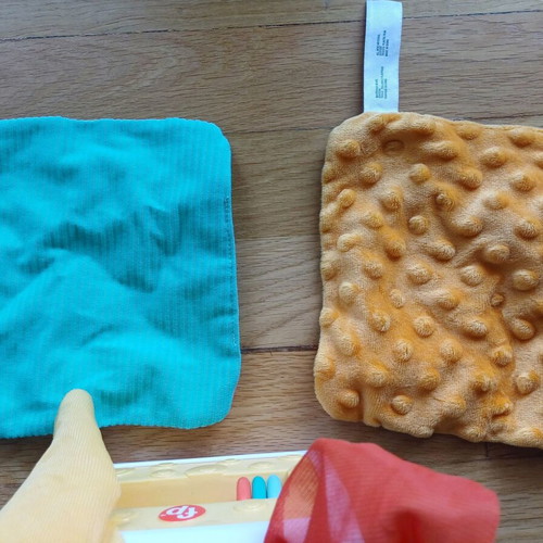 Activity box with scarves like new for babies from 3 months