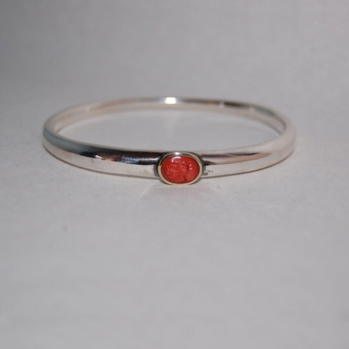 Silver bracelet with carved red coral and 18k gold setting, new