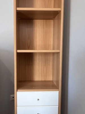 Storage furniture with shelves and drawers