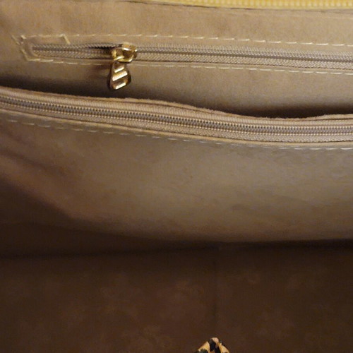 Leopard print women's handbag with strap