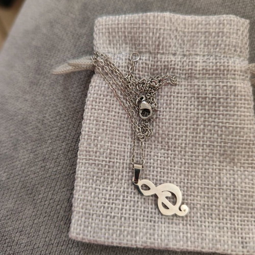 Treble clef necklace