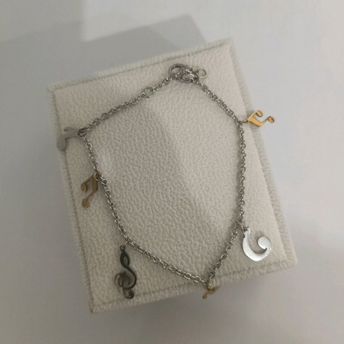 Bracelet with musical notes like new, silver