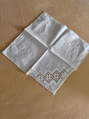 White napkins with cutwork design like new