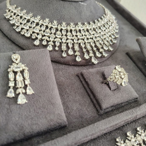 Jewelry set with zircon, like new, silver color, 4 pieces