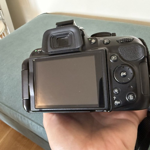 Nikon D5200 DSLR with AF-S DX 18-55mm VR II lens, like new