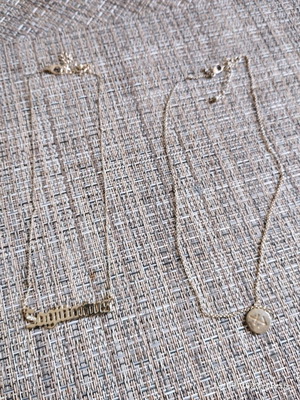 Sagittarius necklace set used, gold color