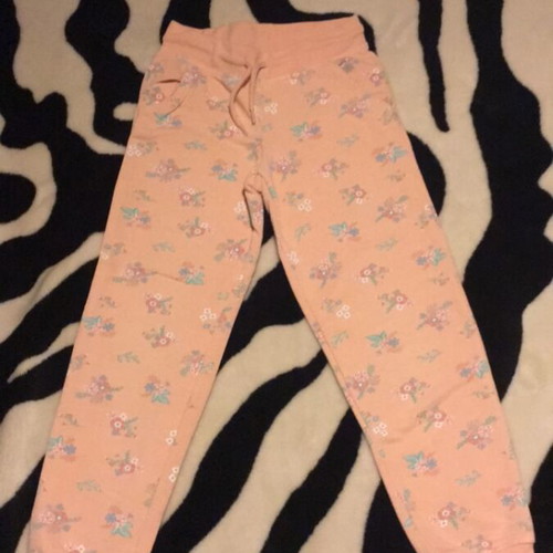 Girls' sweatpants with floral pattern like new, beige