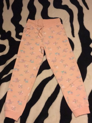Girls' sweatpants with floral pattern like new, beige