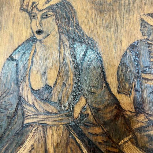Vintage pyrography wall art with artist signature depicting Bouboulina used