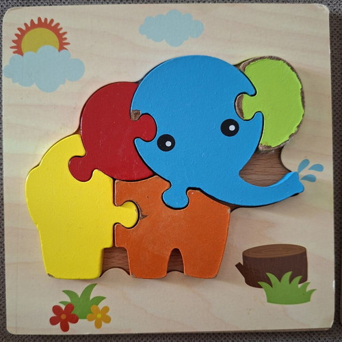 Wooden puzzles for children used, owl and elephant