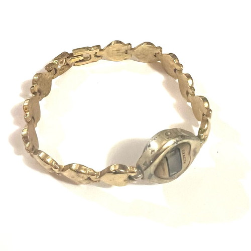Quartz wristwatch used, gold color, women's
