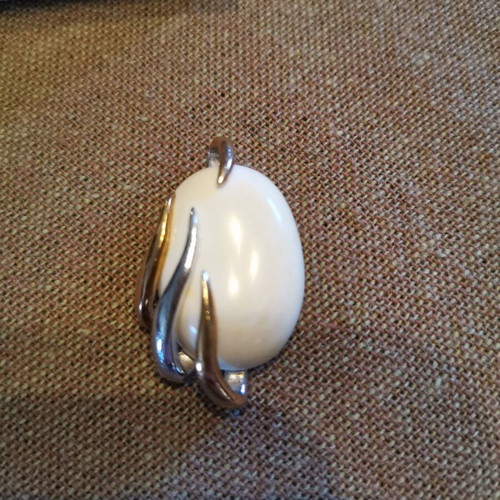 Silver 925 set with white stones used, possibly white coral